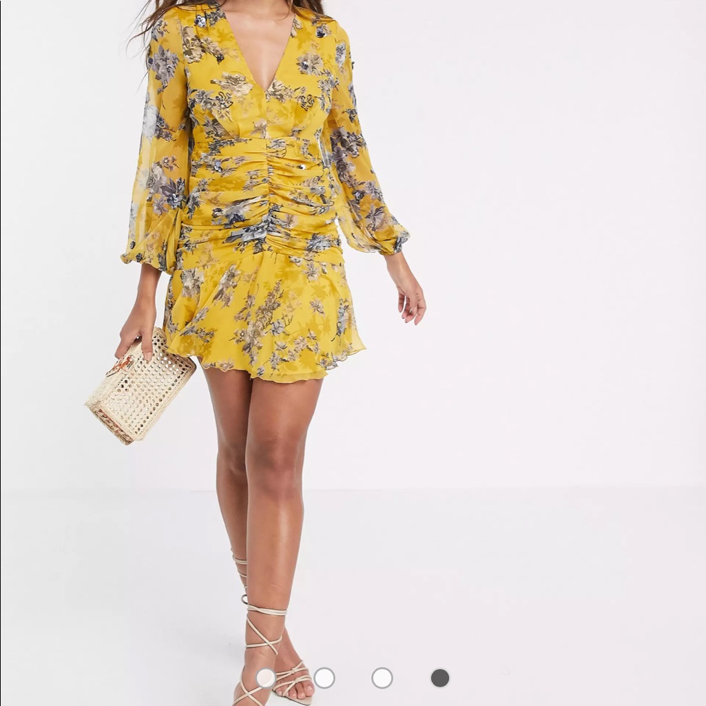Beautiful Long Sleeve Floral Mini Dress With Cluster Embellishment.